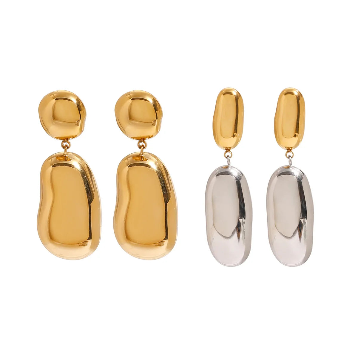 Pair of gold and silver earrings on a white background