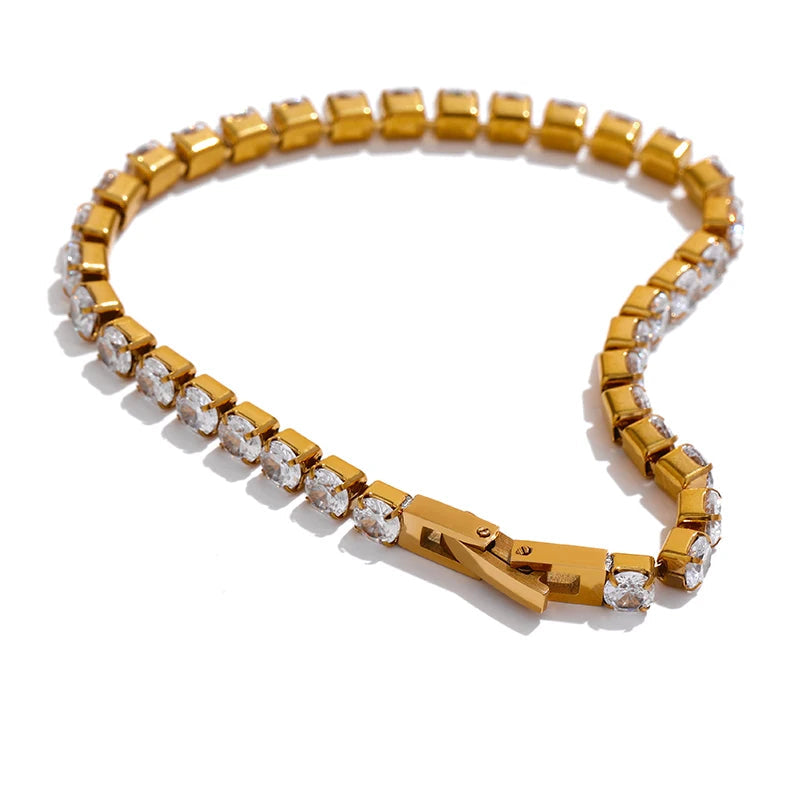 Gold bracelet with crystals on a white background, featuring the brand 'Yhpup'.