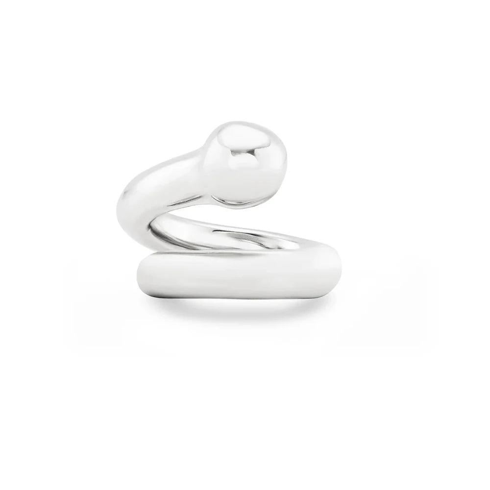 Silver ring with a white ceramic band on a white background