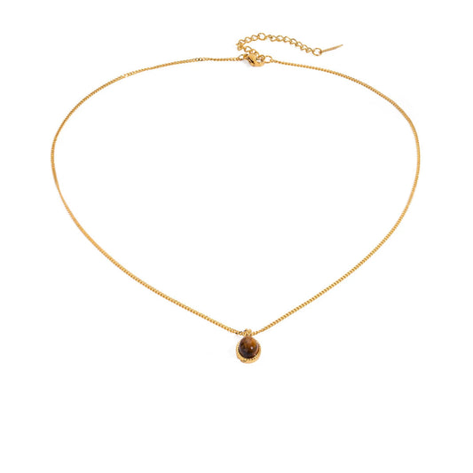 Gold necklace on a white background