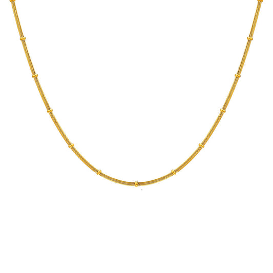 Gold necklace on a white background