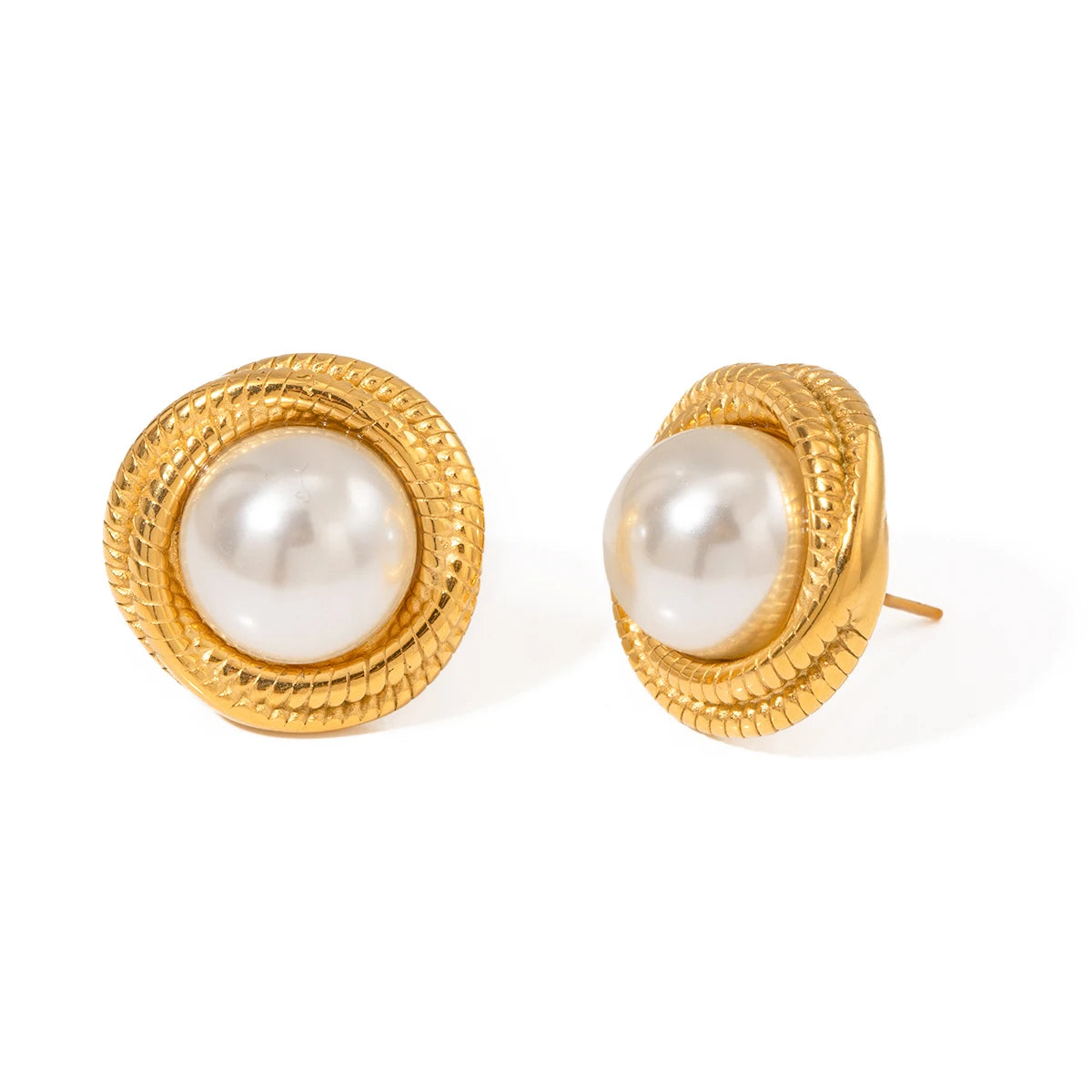 Gold earrings with pearl centers on a white background
