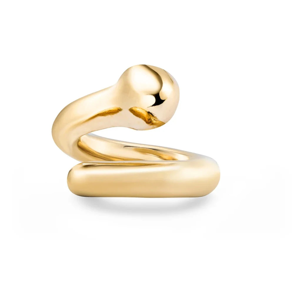 Gold spiral ring on a white background