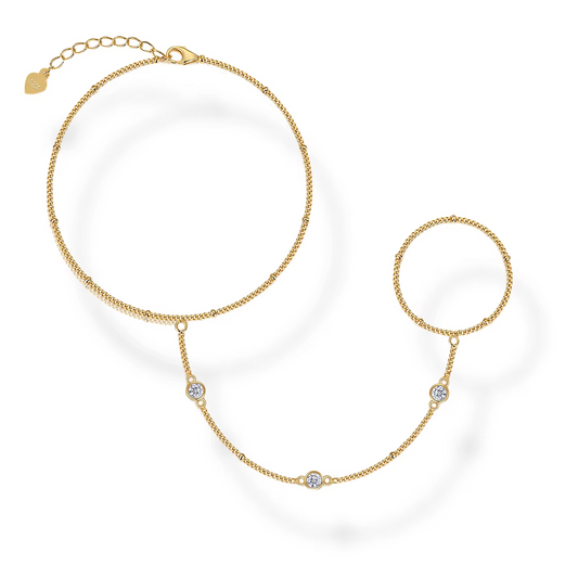 Gold bracelet with diamonds on a white background