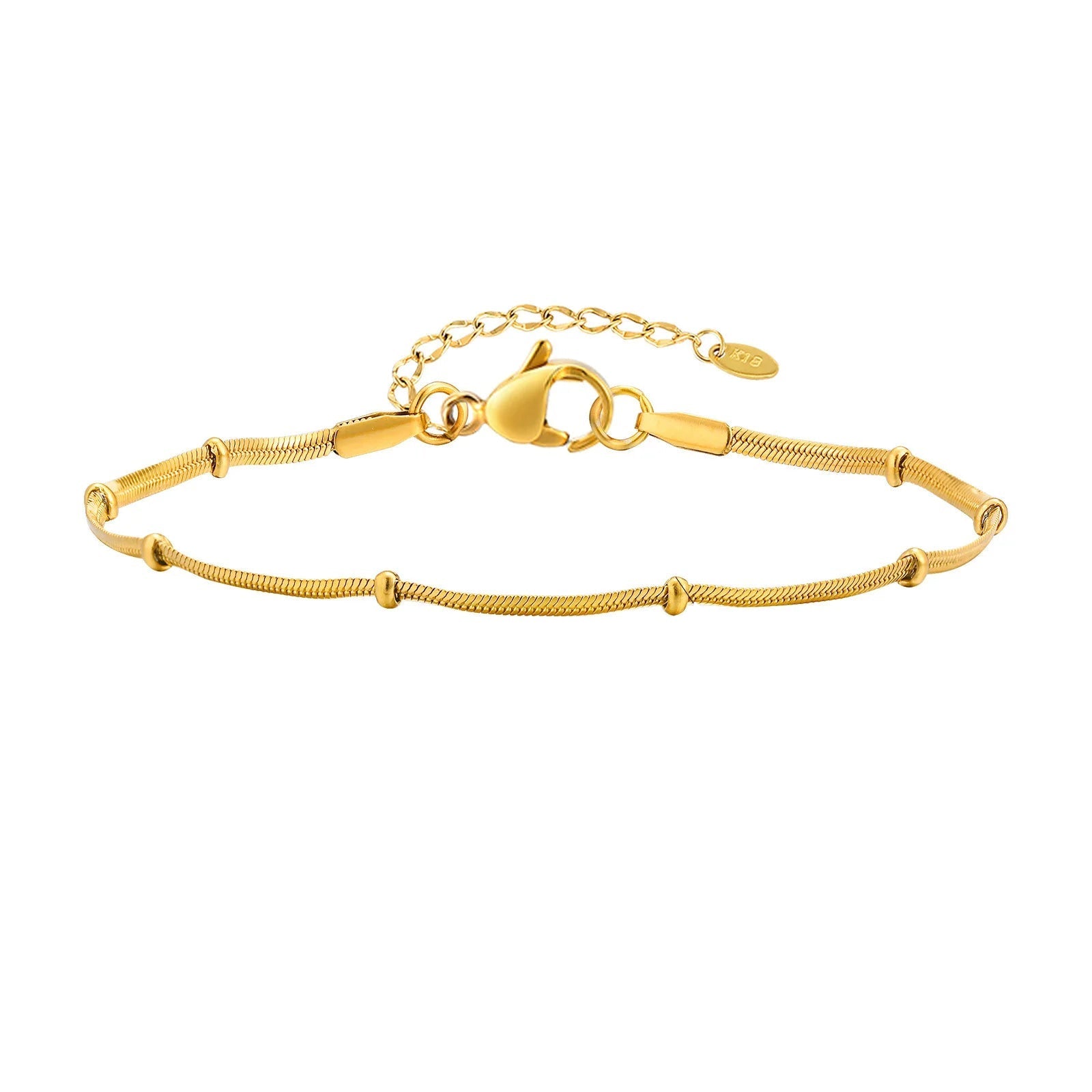 Gold bracelet with measurements on a white background