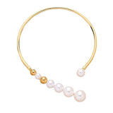 Gold necklace with a distinctive bead opening feature
