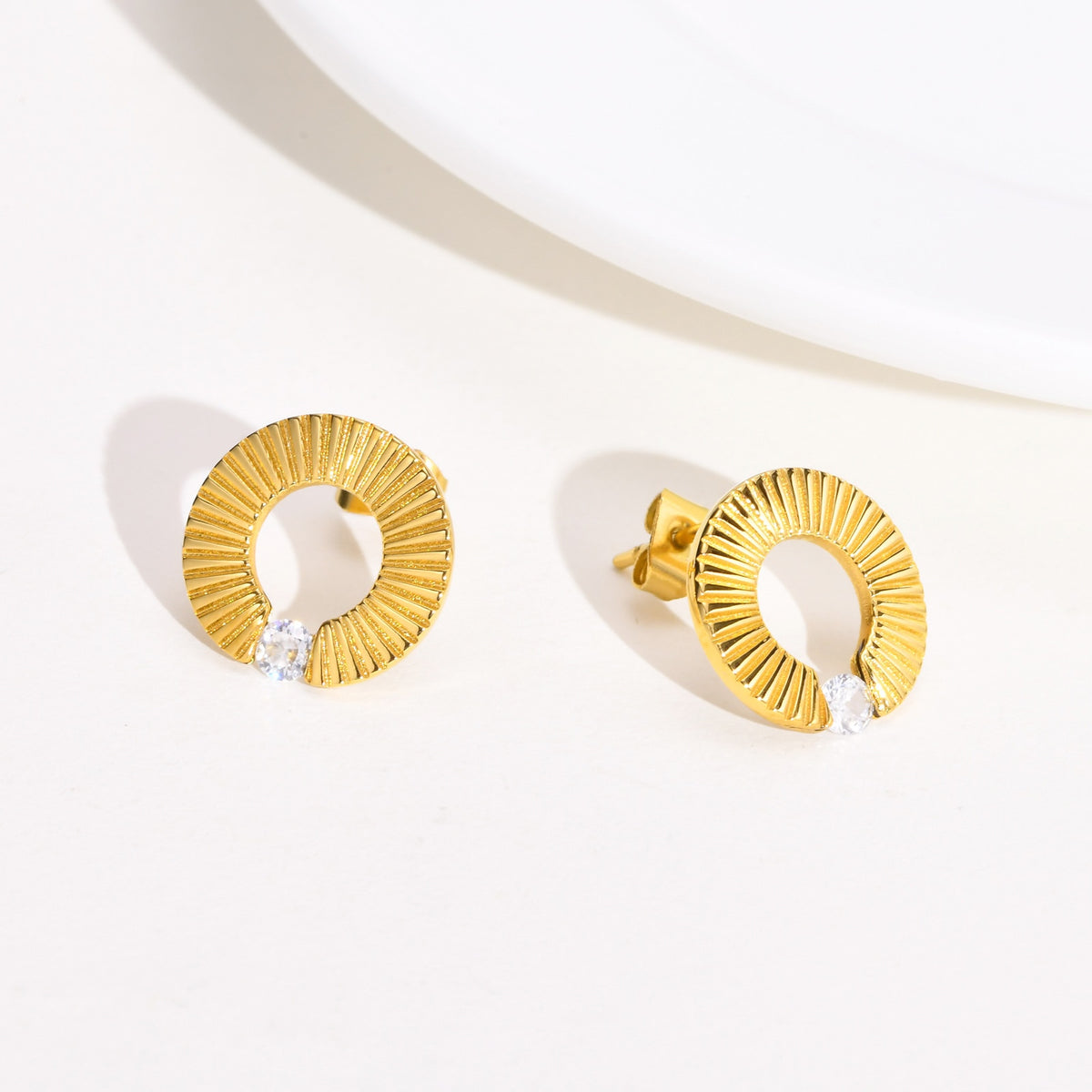 Detailed view of Adina cubic zirconia stud earrings